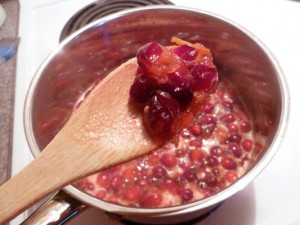Once cranberries burst, remove from heat & add Grand Marnier - Food Gypsy