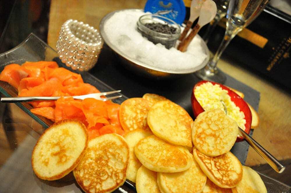 Blinis served with caviar - Food Gypsy