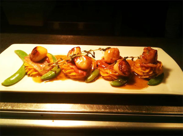 Seared Scallops & Bacon with Sweet Potato Champ, at the pass.  Photo:shford Castle