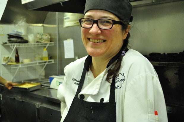 Chef Lili Sullivan, in the kitchen at East & Main Bistro - Food Gypsy