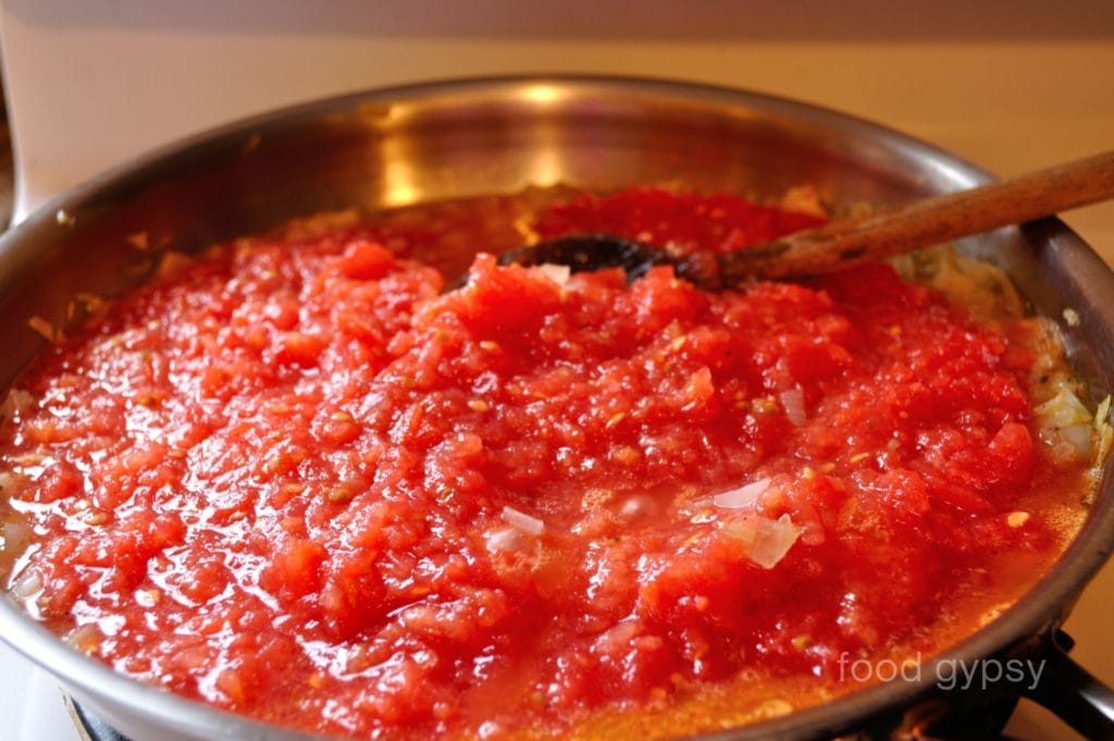 Fresh Tomato Sauce, reduce until it's dark & rich.
